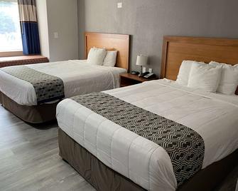 Microtel Inn & Suites by Wyndham Newport News Airport - ניופורט ניוז - חדר שינה