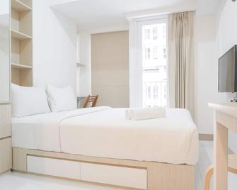 Simply Look and Tidy Studio at Tokyo Riverside PIK 2 Apartment By Travelio - Sepatan - Bedroom