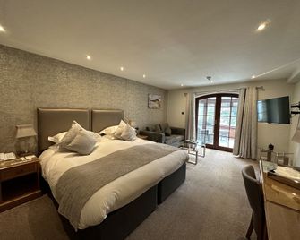 Le Friquet Hotel - Castel - חדר שינה