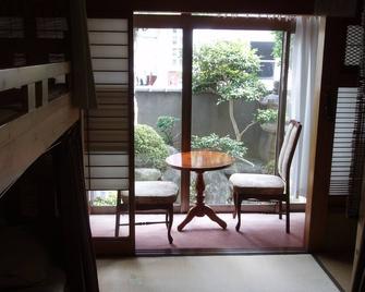 Takama Guest House - Hostel - Nara - Camera da letto
