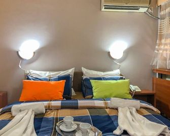 Hotel Square - Skopje - Schlafzimmer
