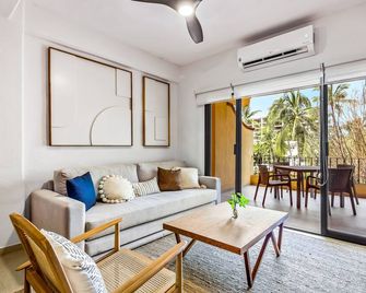 Marina condo near golf course, beach, & dining with pool & tennis courts - Puerto Vallarta - Living room