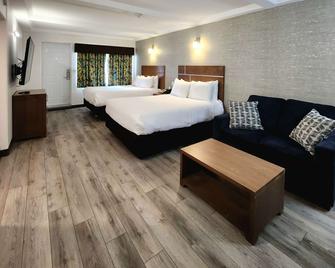 Quality Inn & Suites - Clearwater - Schlafzimmer