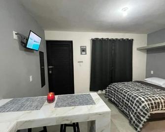 Departamentos Caracoles Miramar - Madero - Bedroom