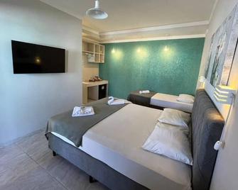 Pousada Fast Inn - Guarujá - Quarto