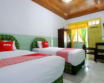 OYO 1865 Hotel Ss Syariah - Bengkulu - Schlafzimmer