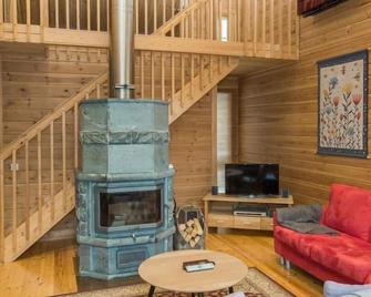 Holiday Home Syvärinkulta b by Interhome - Nilsiä - Sala de estar