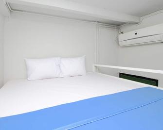 Kamar Keluarga Bandara V Syariah - Tangerang - Habitación