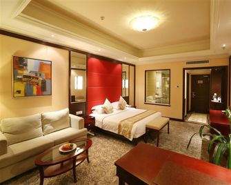 Qingdao Kuaitong International Hotel - Qingdao - Yatak Odası