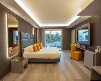 Hotel & Resort Tre Fontane Luxury - Portici - Camera da letto