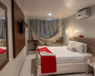 بوسادا فلور دي ماراكا - بورتو دي جاليناس - غرفة نوم