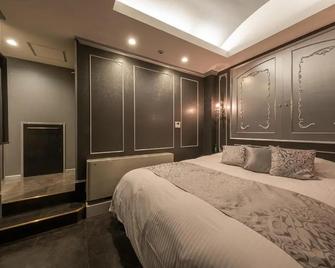 Hotel Birthday Kakamigahara - Kakamigahara - Schlafzimmer