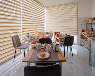 Reddimus Guest House - Nápoles - Restaurante