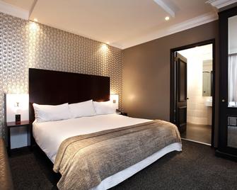 Manhattan Hotel - Pretoria - Schlafzimmer