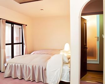 Hotel Suncrown Oaso - Aso - Schlafzimmer