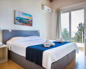 Magganos Sunset Villas - Maggano - Schlafzimmer