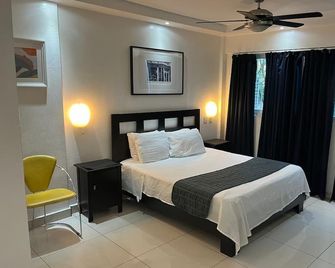 City Caribbean Hotel Boutique - Santo Domingo - Yatak Odası