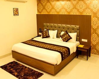Hotel Delite Grand - Jabalpur - Bedroom