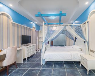Xia Yi Zhan Style Theme Inn - Zhangjiajie - Bedroom