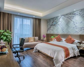 Mango City Inn (Moon Lake Park North Metro · Window of the World Mango Pavilion) - Changsha - Bedroom