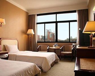 Shanshui Trends Hotel - Changsha - Schlafzimmer
