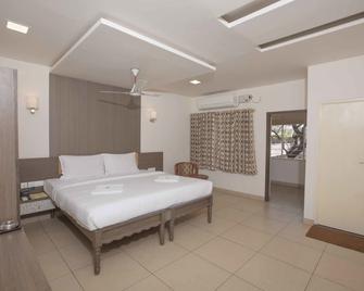 Hotel Sownthariyam - Palani - Slaapkamer