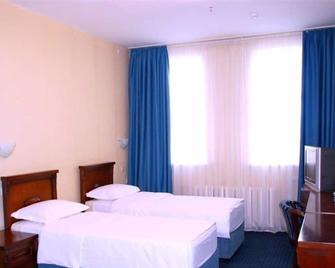 Tengri Hotel - Astana - Schlafzimmer