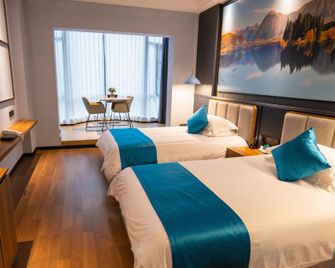 Changlv Qinlu Yunqi Hotel (Jinggangshan Hongjun North Road Branch) - Ji'an - Slaapkamer