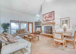 Condo With Mountain Views, Cozy Wood Burning Fireplace, & Private Gas Grill! - Angel Fire - Living room