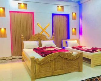 Grace Palace Hotel - Kalam - Bedroom