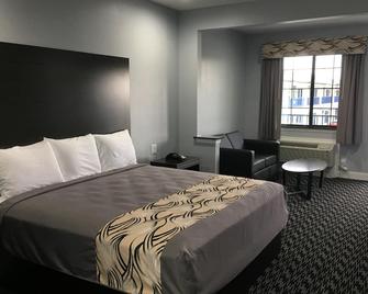 Platinum Inn And Suites - Houston - Bedroom