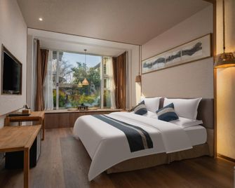 Shangquan Lishe (Ji'nan Daminghu Scenic Area) - Jinan - Schlafzimmer