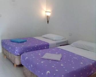 Charlie Langkawi Motel - Pantai Cenang - Schlafzimmer