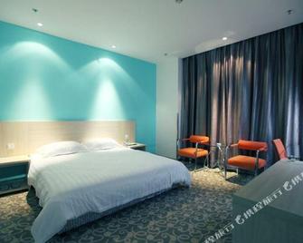 Motel 168 Chizhou Cuibai Road Branch - Chizhou - Bedroom