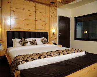 Hotel Grand Sharan - Katra - Phòng ngủ