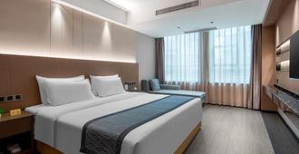Beautiful Landscape Hotel - Liangshan - Bedroom