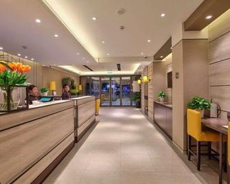 Home Inn Plus Ningbo Laowaitan Tianyi Square - Ningbo - Receptie