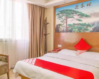 Foshan Taitian Hotel - Foshan - Bedroom