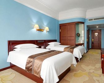 Qingdao University International Hotel - Qingdao - Habitación