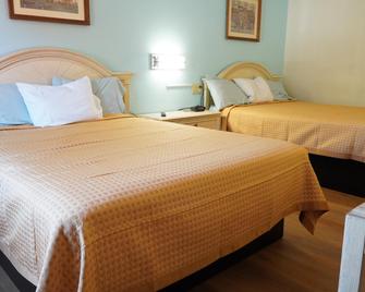 Quality Quarters Inn - Richmond - Κρεβατοκάμαρα