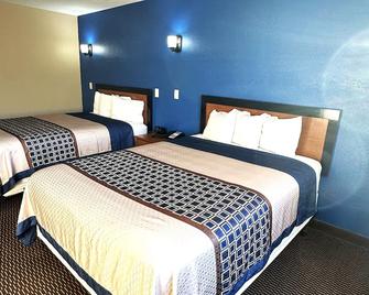 Eco-Lux Inn Norfolk - Norfolk - Спальня