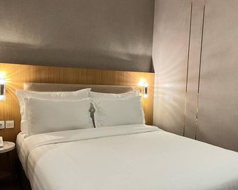 d'primahotel Airport Jakarta Terminal 3 Wellness Center - Tangerang City - Bedroom