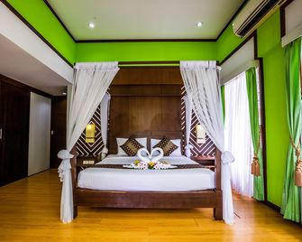 Phi Phi Andaman Beach Resort - קופיפי - חדר שינה