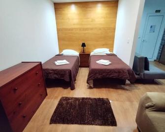 Apartamentos Lisboa - فيلا دو بورتو - غرفة نوم