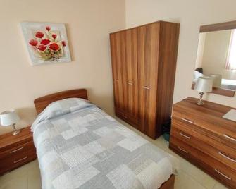 Doms Apartment - Tarscen - Camera da letto