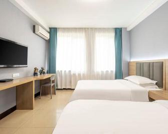 Jingyuan Collection Hotel (Fengzhou Road Wanda Plaza) - Hohhot - Bedroom