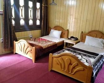 Apex Inn Trackers Guest House - Sharda - Habitación