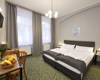 فندق بوسطن - كارلوفي فاري - غرفة نوم