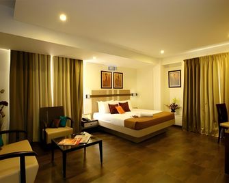Hotel Utsav Deluxe - Pune - Bedroom