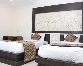 Hotel Galaxy - Prayagraj - Bedroom